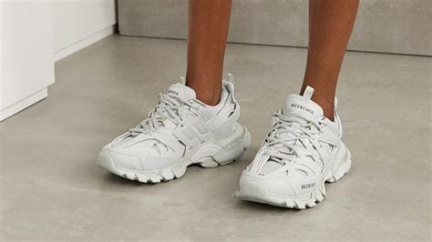 white balenciaga track on foot.